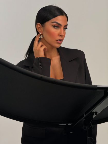 MOZA Fine Jewellery black butterfly earrings worn by model